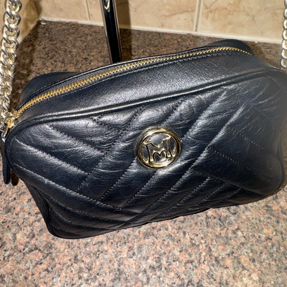 Metrocity Black Crossbody Bag with Gold Accents